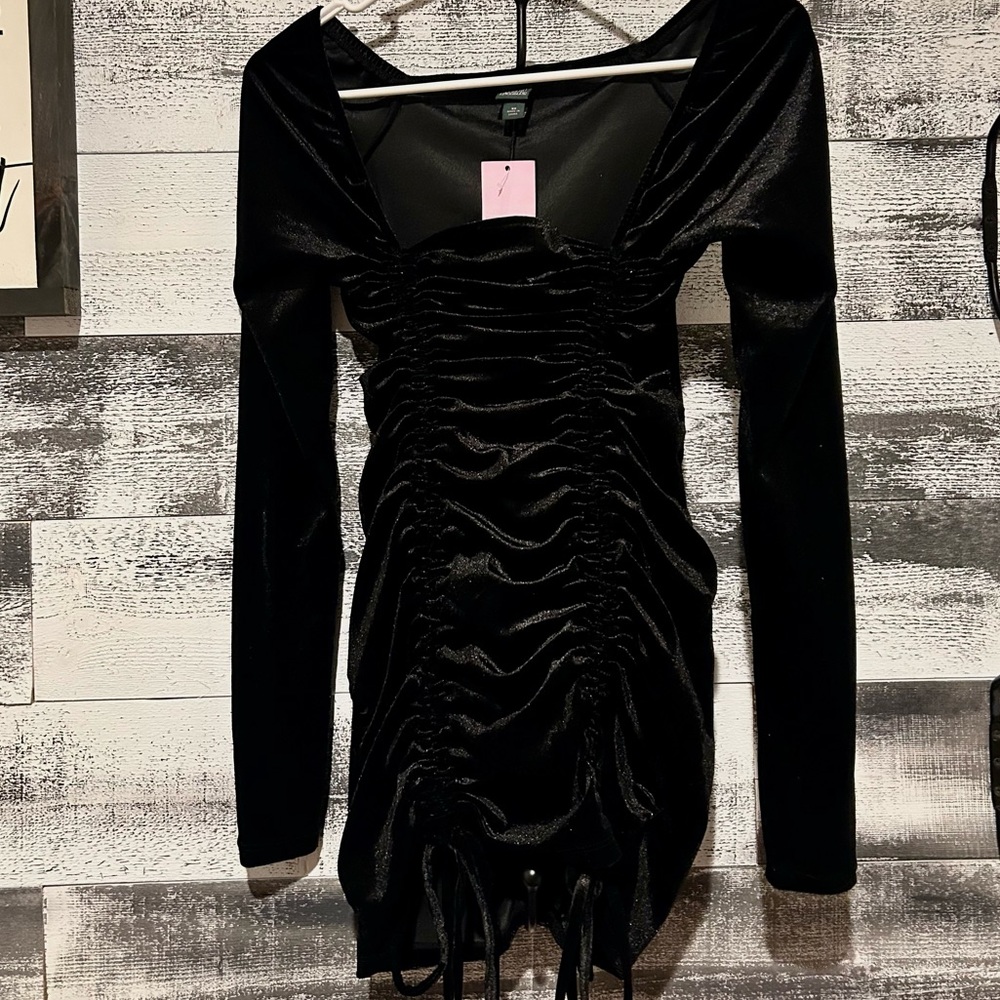 New with tags short black dress